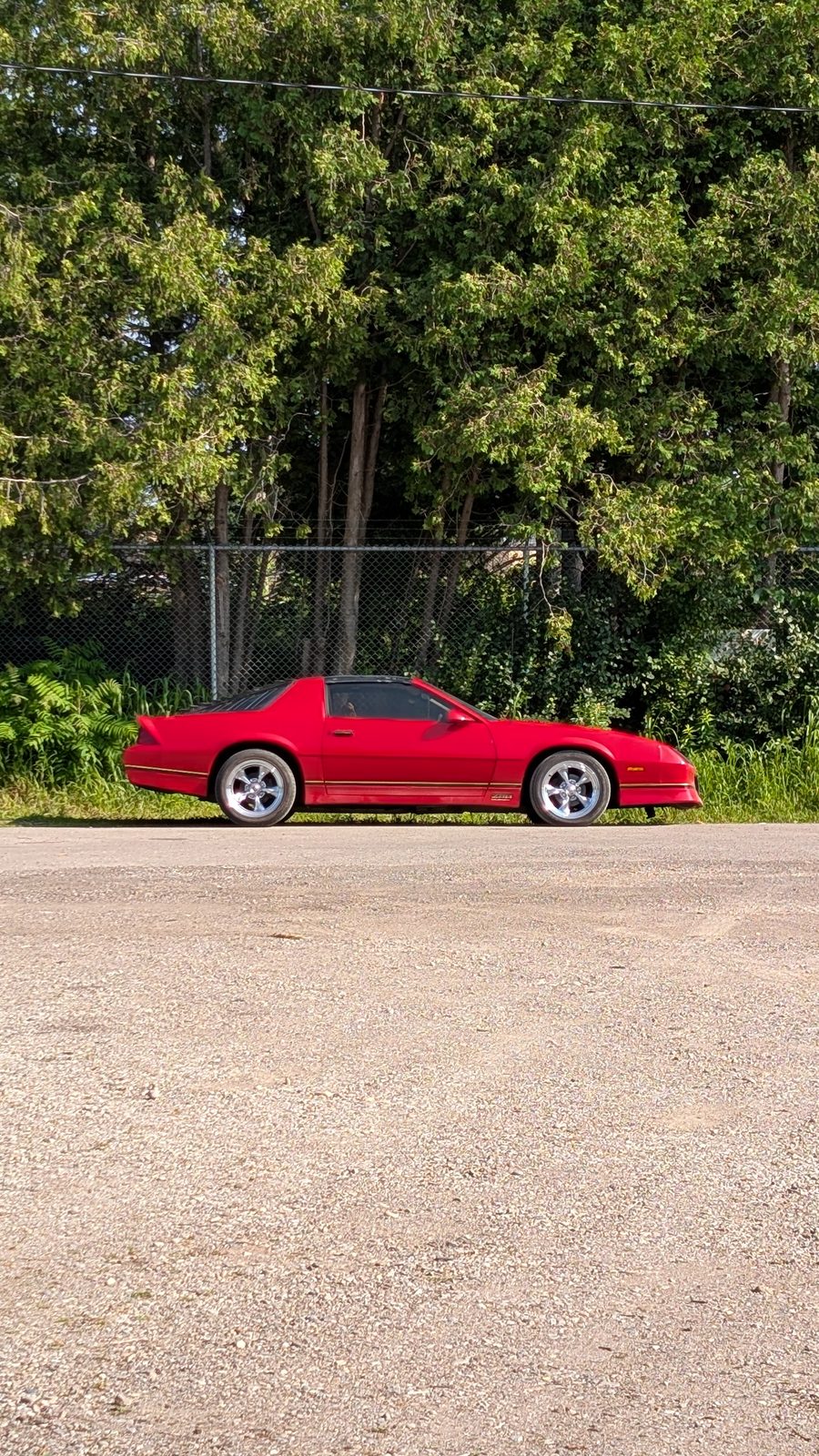 Front three-quarter of the restored red Firebird